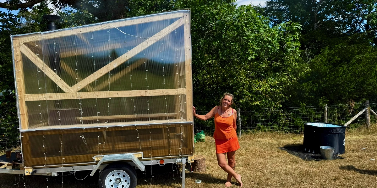 Mobile wood-fired sauna trailer with portable cold plunge tub available for hire